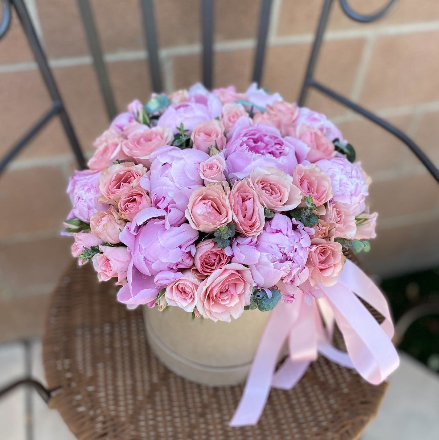 # 35 Pink Peonies with spray roses in box
