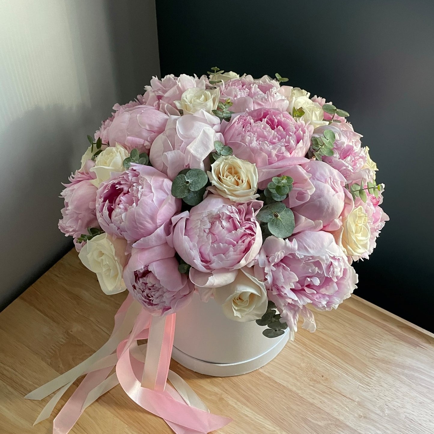 # 51 Pink Peonies with White Roses in box