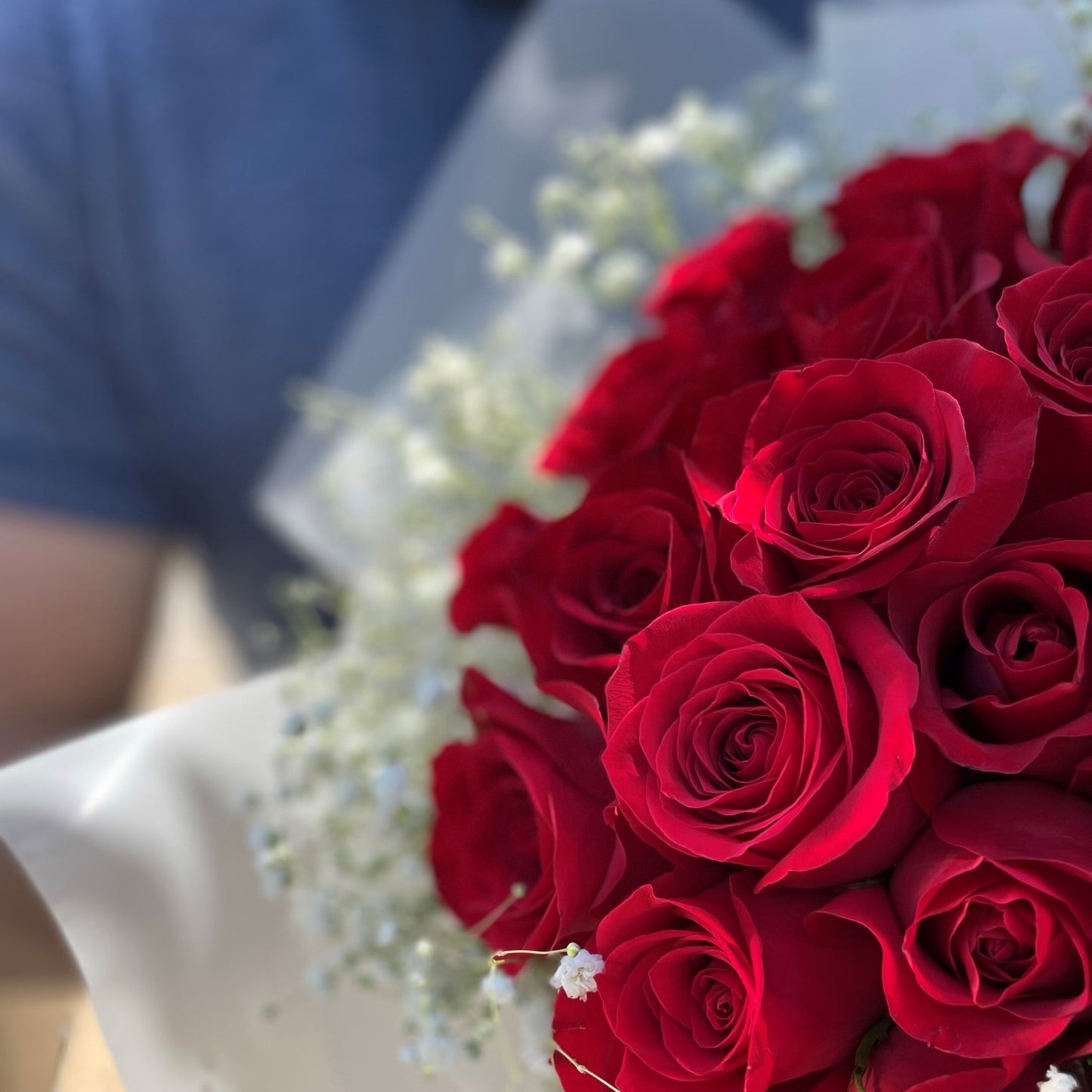 # 46 Red Roses with Baby Breath, Bouquet.