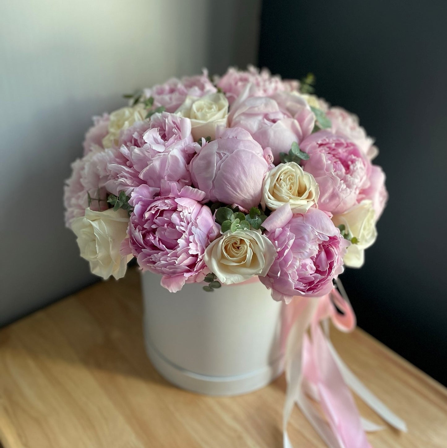 # 51 Pink Peonies with White Roses in box