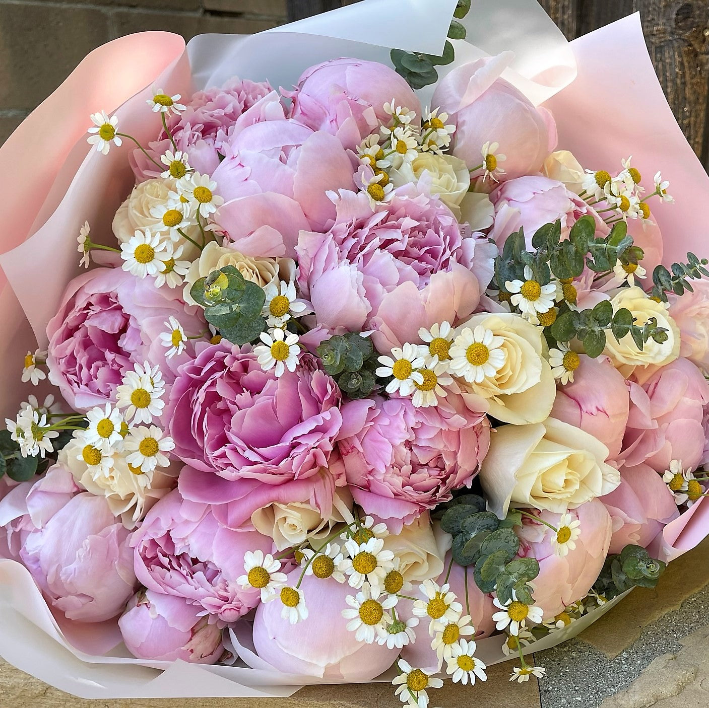 # 49 Tender bouquet with peonies and roses