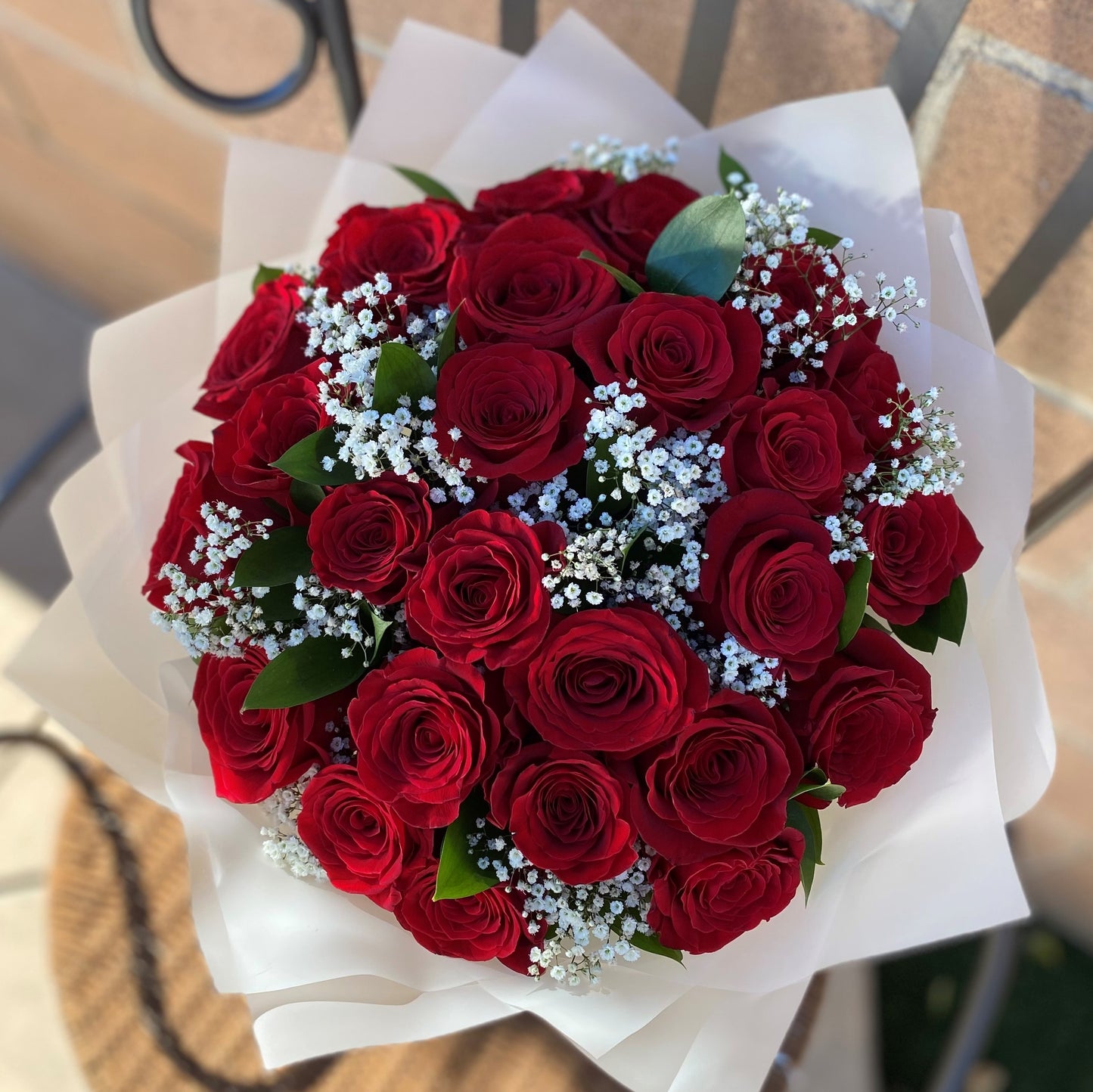 # 22 Red Roses with Baby Breath, Bouquet.