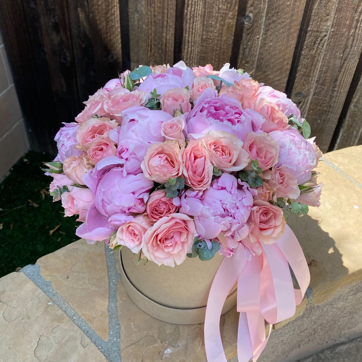 # 35 Pink Peonies with spray roses in box