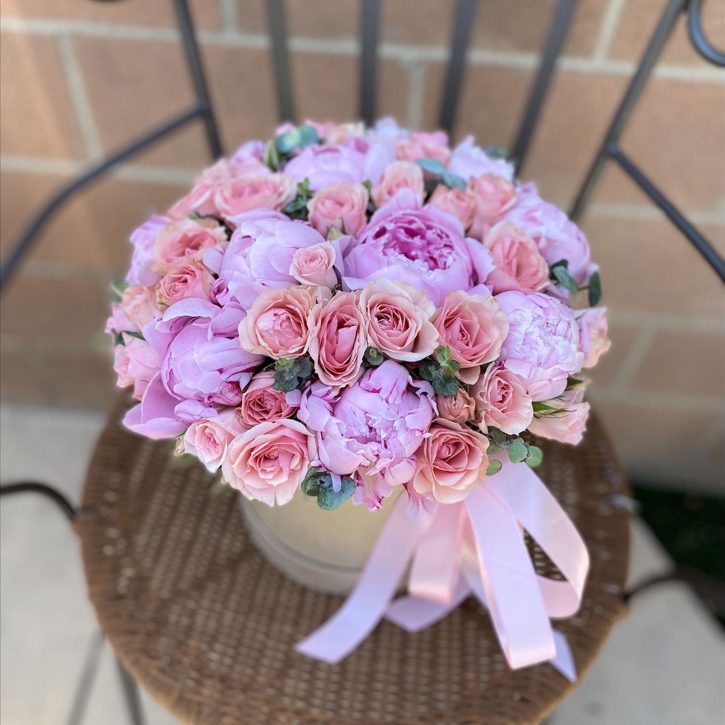 # 35 Pink Peonies with spray roses in box