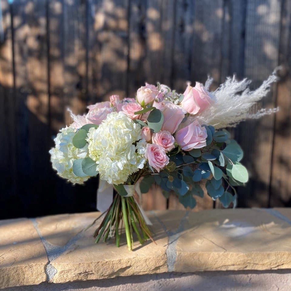 # 10 Stylish Bouquet with hydrangea, roses and pampas grass.