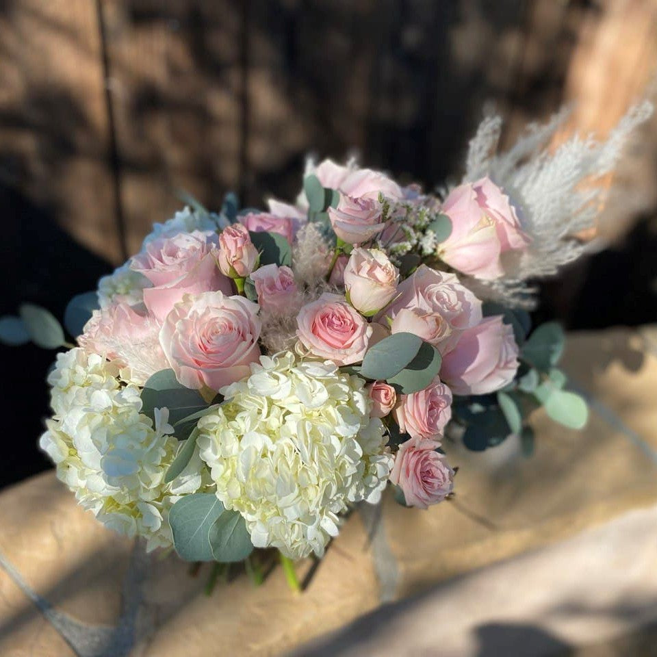 # 10 Stylish Bouquet with hydrangea, roses and pampas grass.